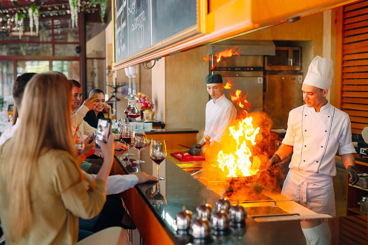 The chef prepares food in front